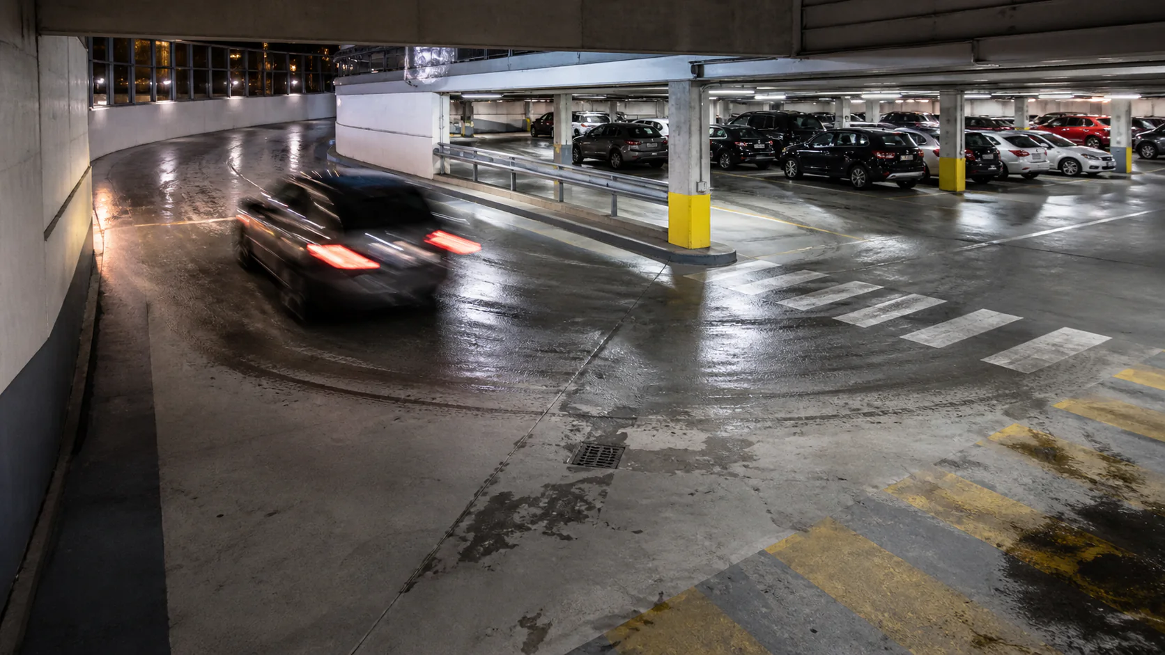 Finished commercial parkade surface showing traffic, drainage and pedestrian zones